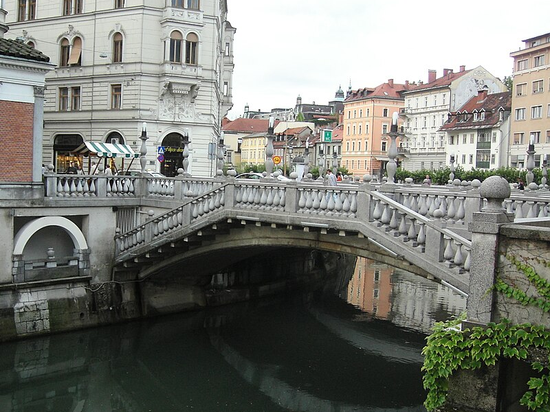 Triple Bridge in Ljubljana — three parallel pedestrian bridges crossing the Ljubljanica River